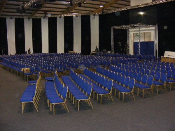 blue chairs ready for the guests